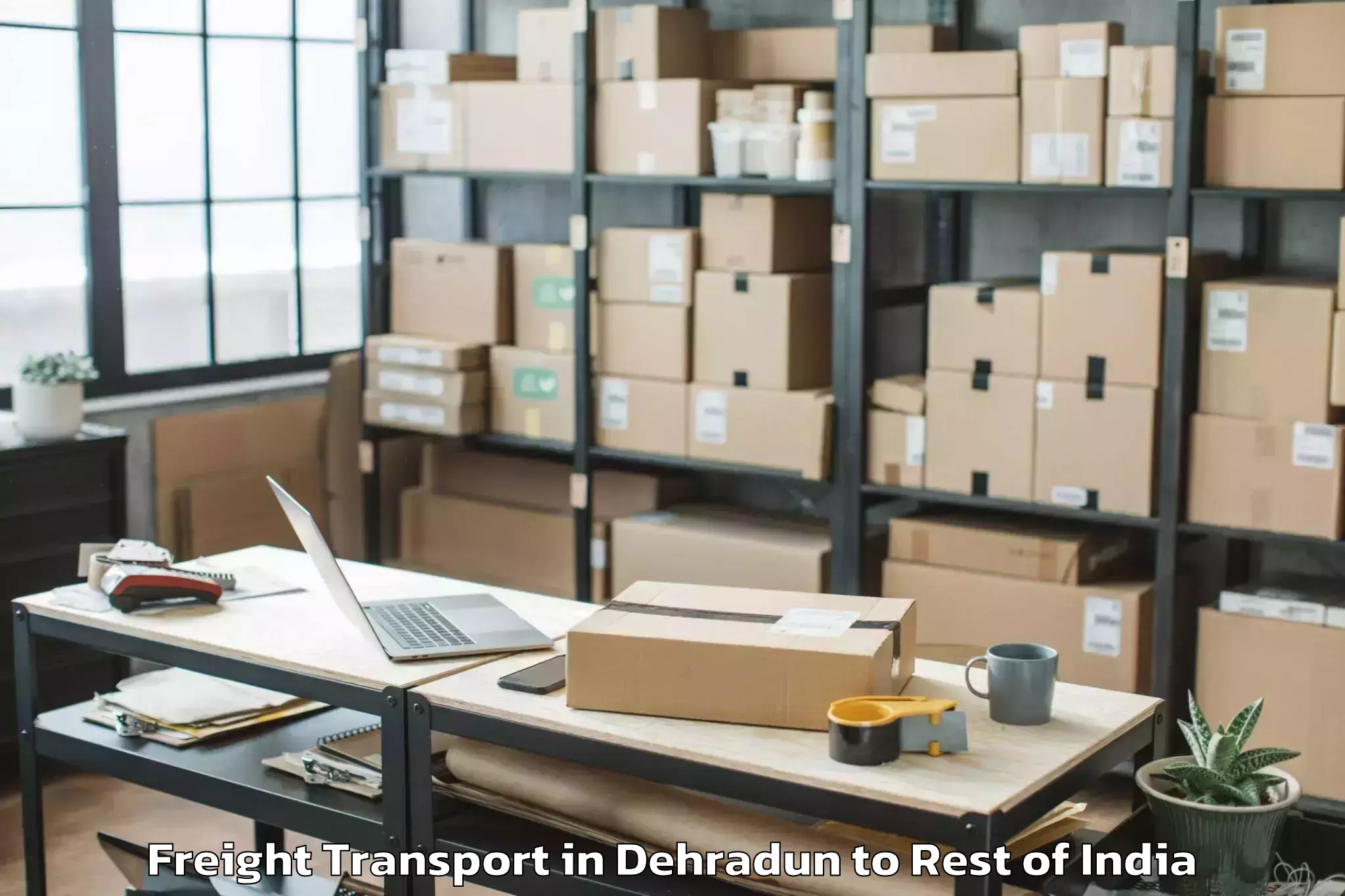 Trusted Dehradun to Mutharam Freight Transport